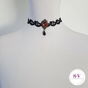 Black lace choker with red gemstones